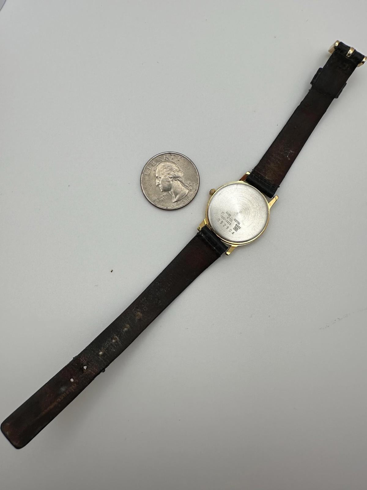 Vintage Seiko Quartz Watch – Gold-Tone Case, Minimalist Black Dial, 27mm