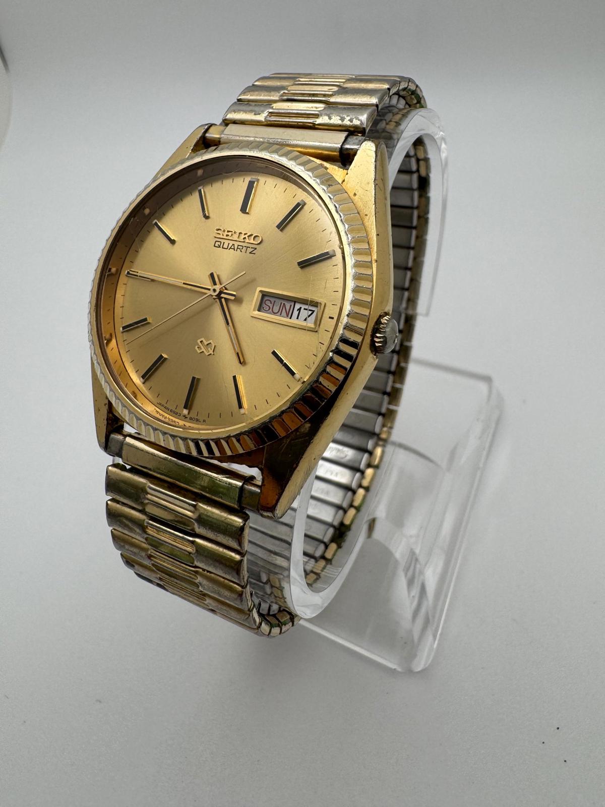 Vintage Seiko Quartz Men’s Watch – Gold Tone, Day/Date, 34mm (1970s–1980s Era)