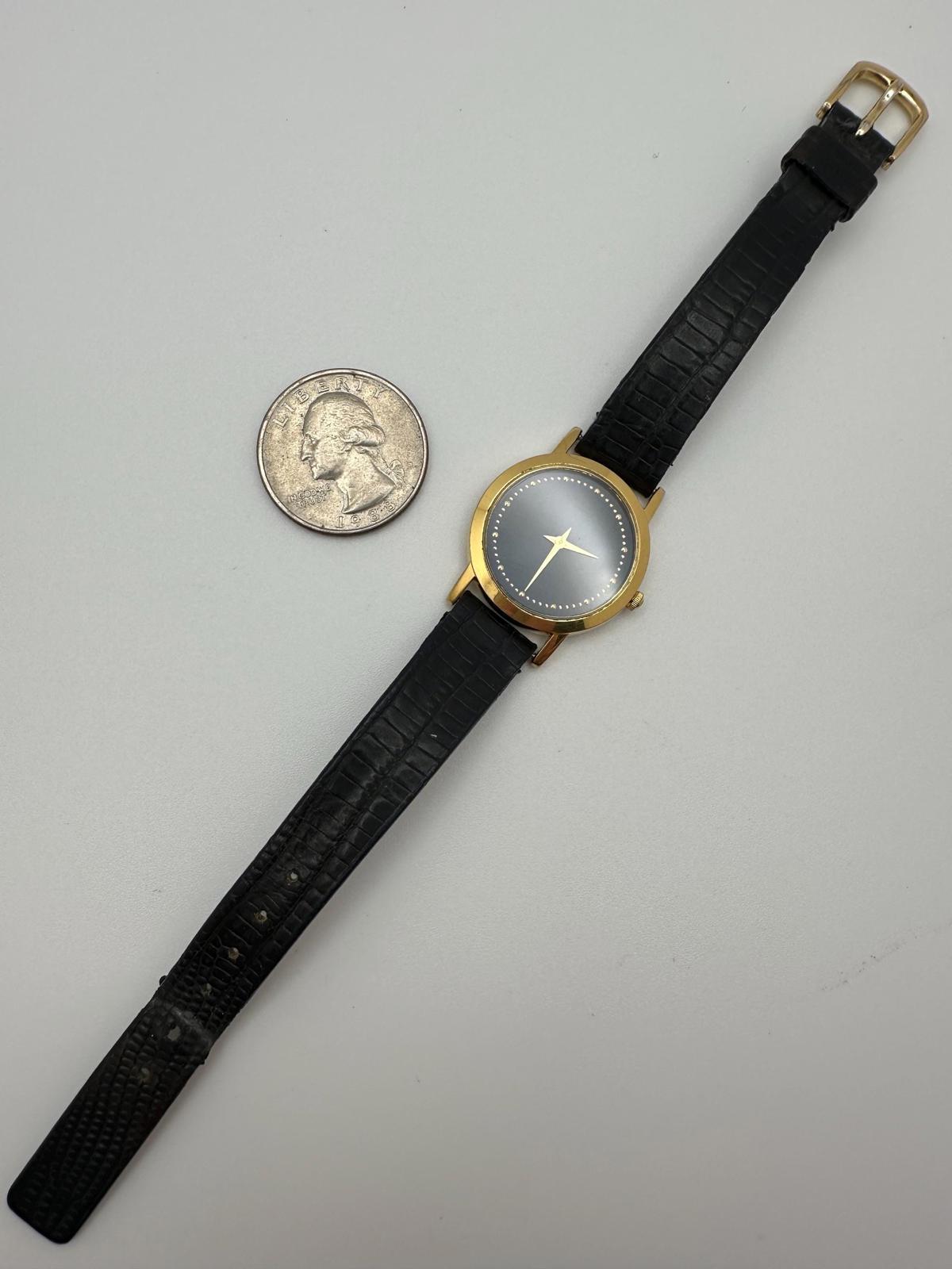 Vintage Seiko Quartz Watch – Gold-Tone Case, Minimalist Black Dial, 27mm