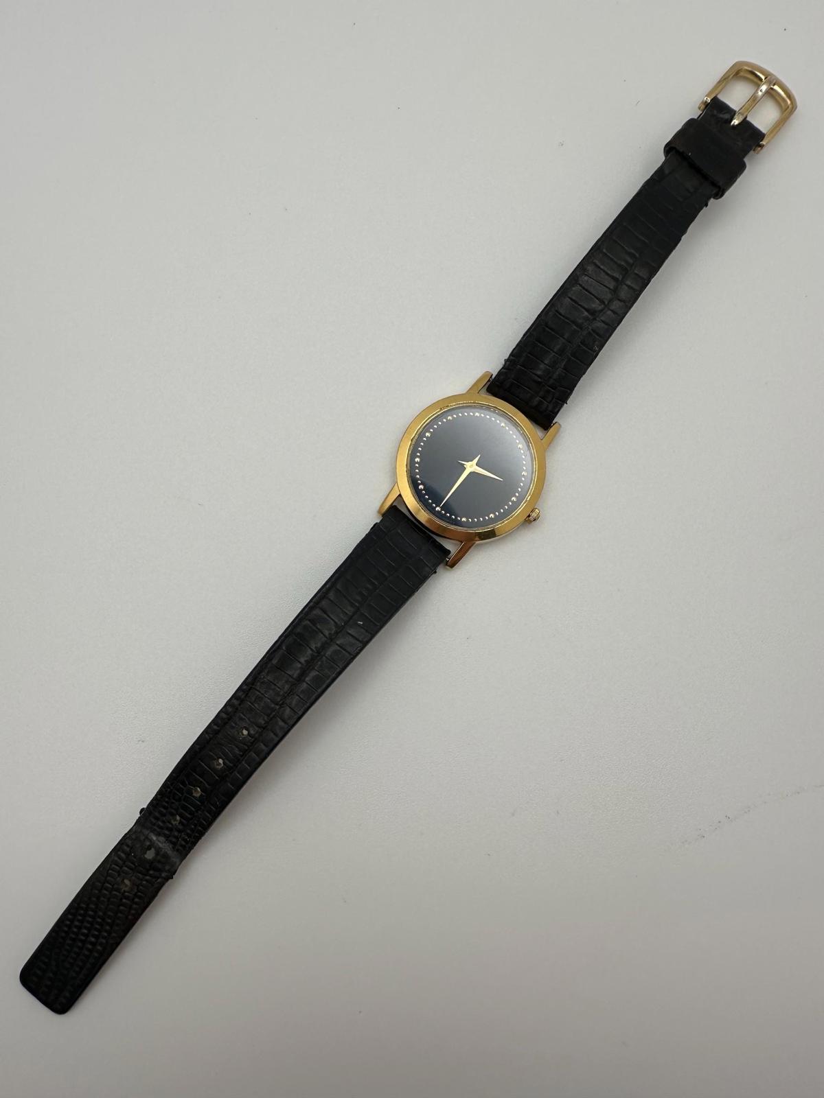 Vintage Seiko Quartz Watch – Gold-Tone Case, Minimalist Black Dial, 27mm