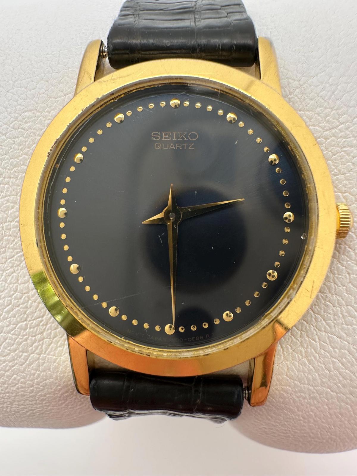 Vintage Seiko Quartz Watch – Gold-Tone Case, Minimalist Black Dial, 27mm