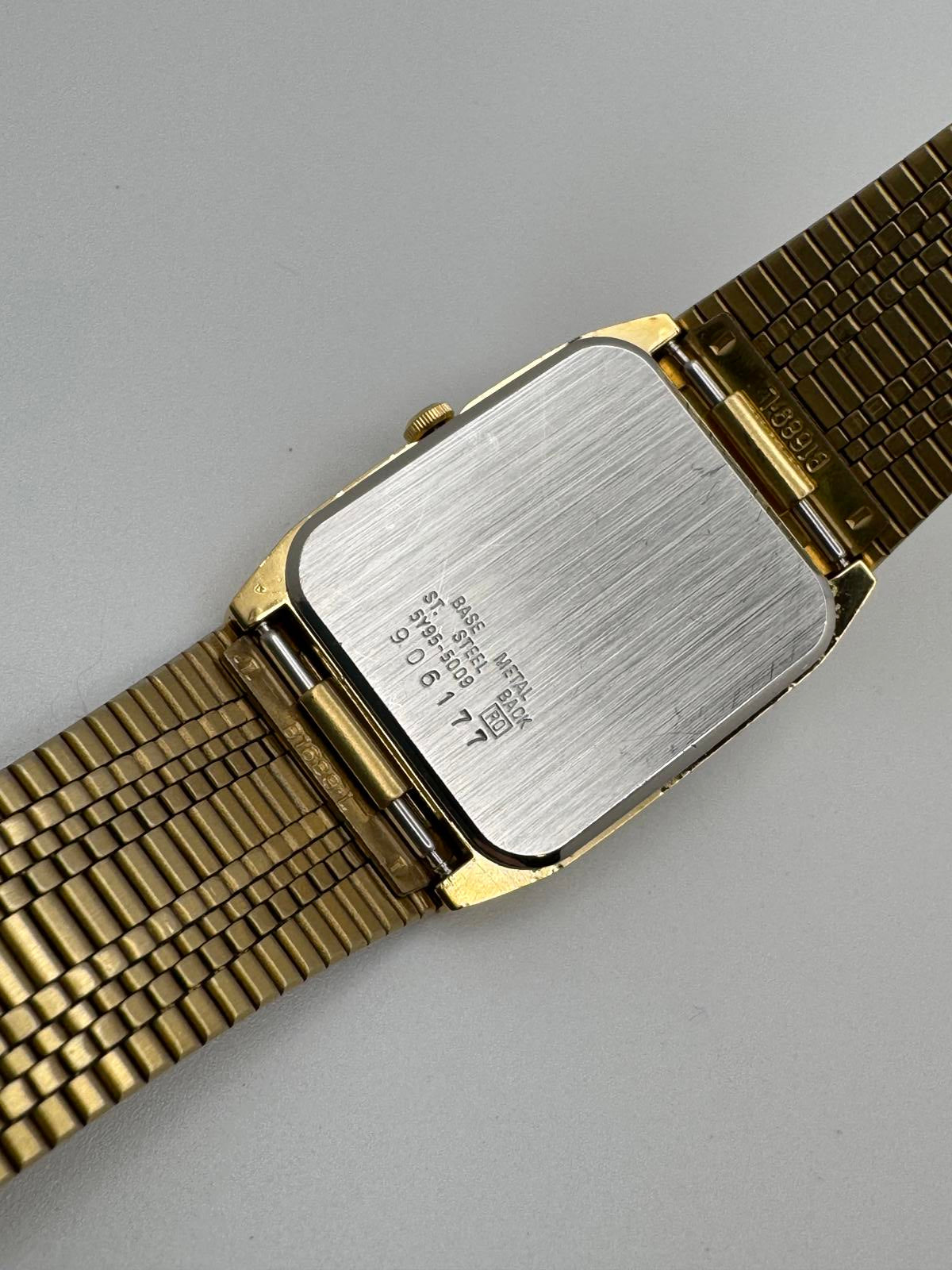 Vintage Seiko Quartz Men’s Watch – 26mm Gold Rectangular Case, Black Dial