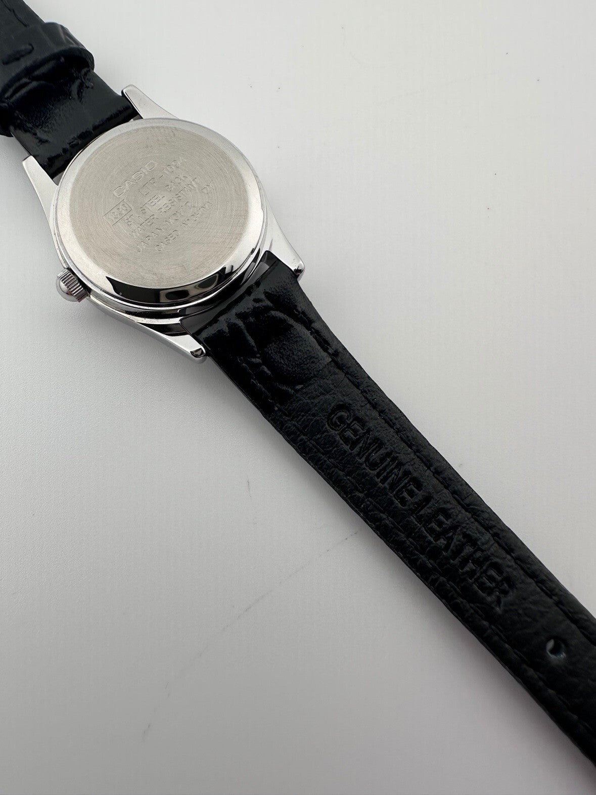 Casio Womens Quartz Watch 22mm Silver White Dial Black Leather LTP-1094E-7A