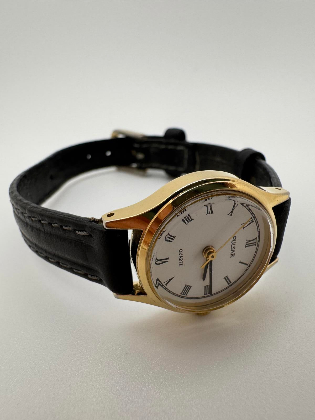 Vintage Pulsar Gold Tone Petite Quartz Watch 21mm Roman Dial Japan Movement