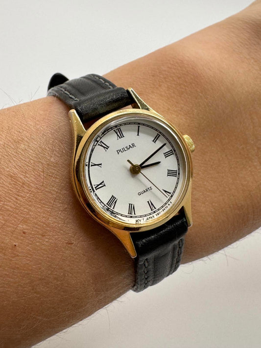 Vintage Pulsar Gold Tone Petite Quartz Watch 21mm Roman Dial Japan Movement