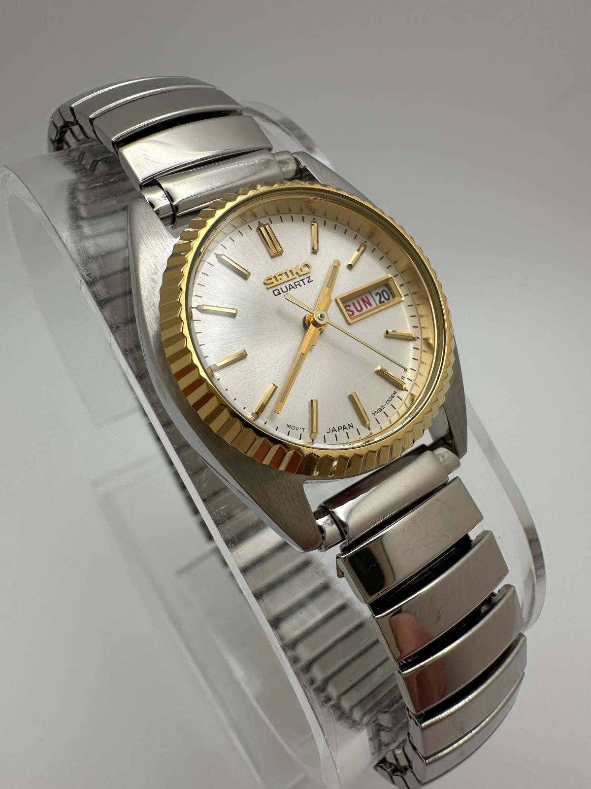 Vintage Seiko Quartz Women’s Watch 24mm Gold Bezel Silver Dial Stretch Band