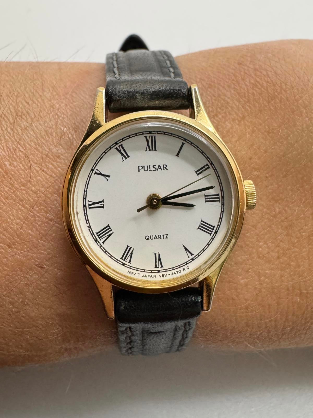 Vintage Pulsar Gold Tone Petite Quartz Watch 21mm Roman Dial Japan Movement