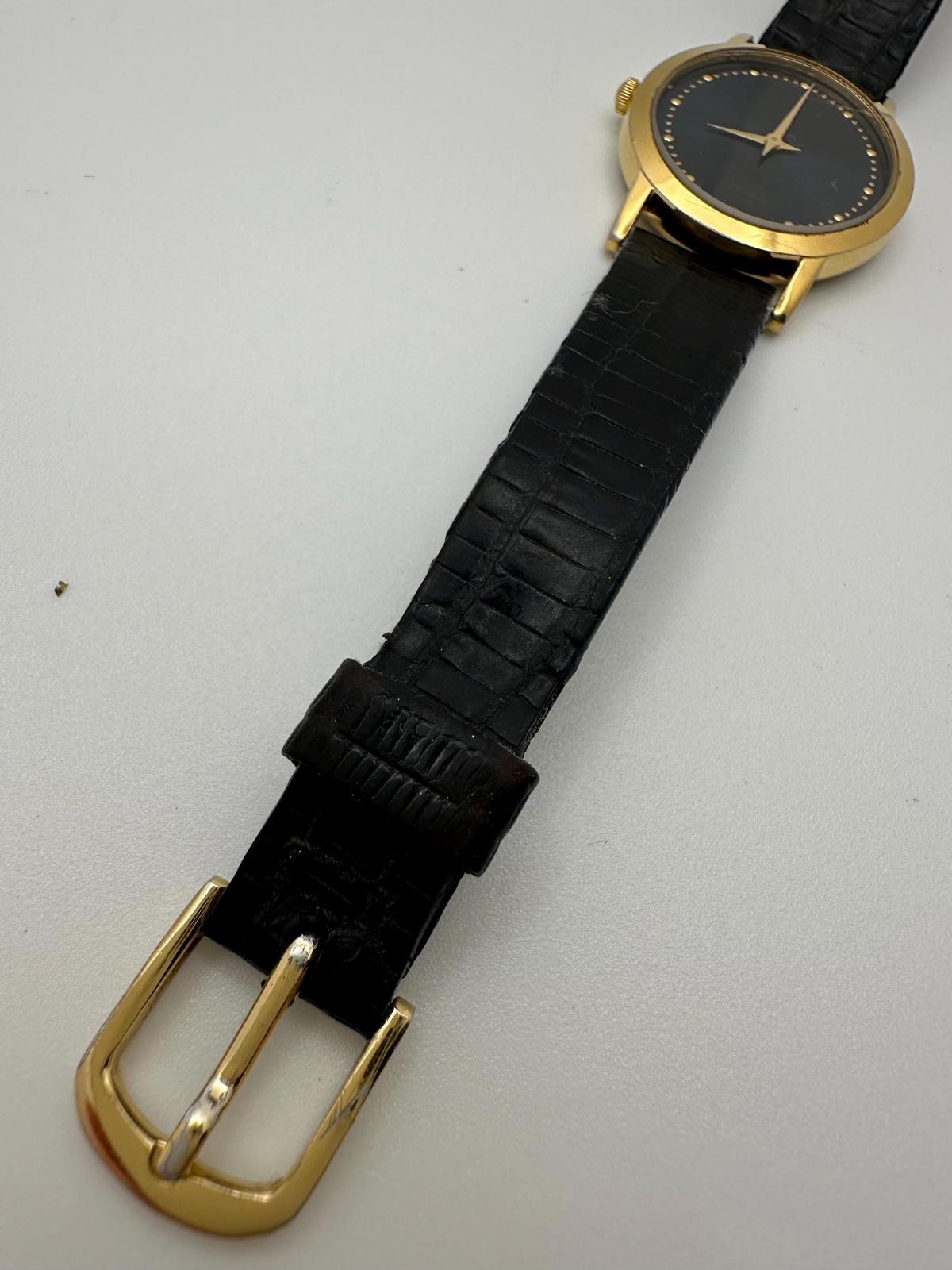 Vintage Seiko Quartz Watch – Gold-Tone Case, Minimalist Black Dial, 27mm