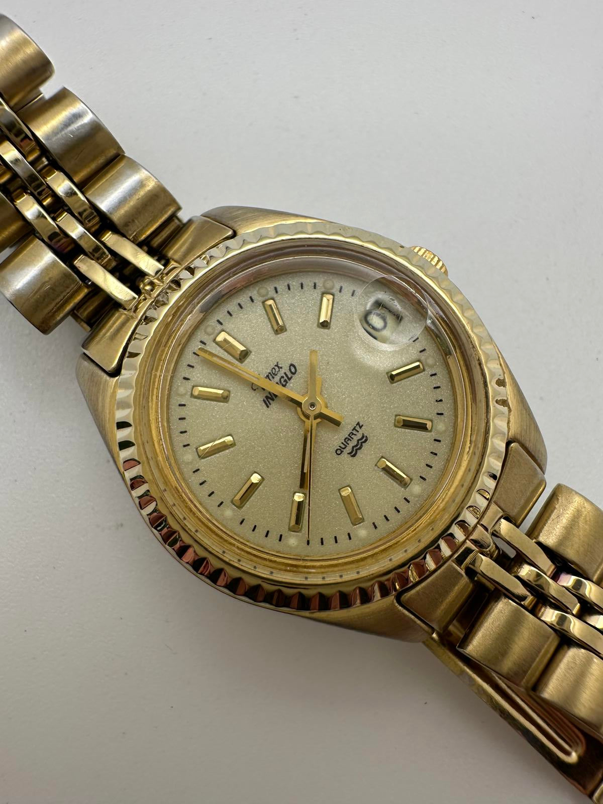 Vintage Timex Indiglo Quartz Watch – Gold Tone, Date Magnifier, Luminous Dial