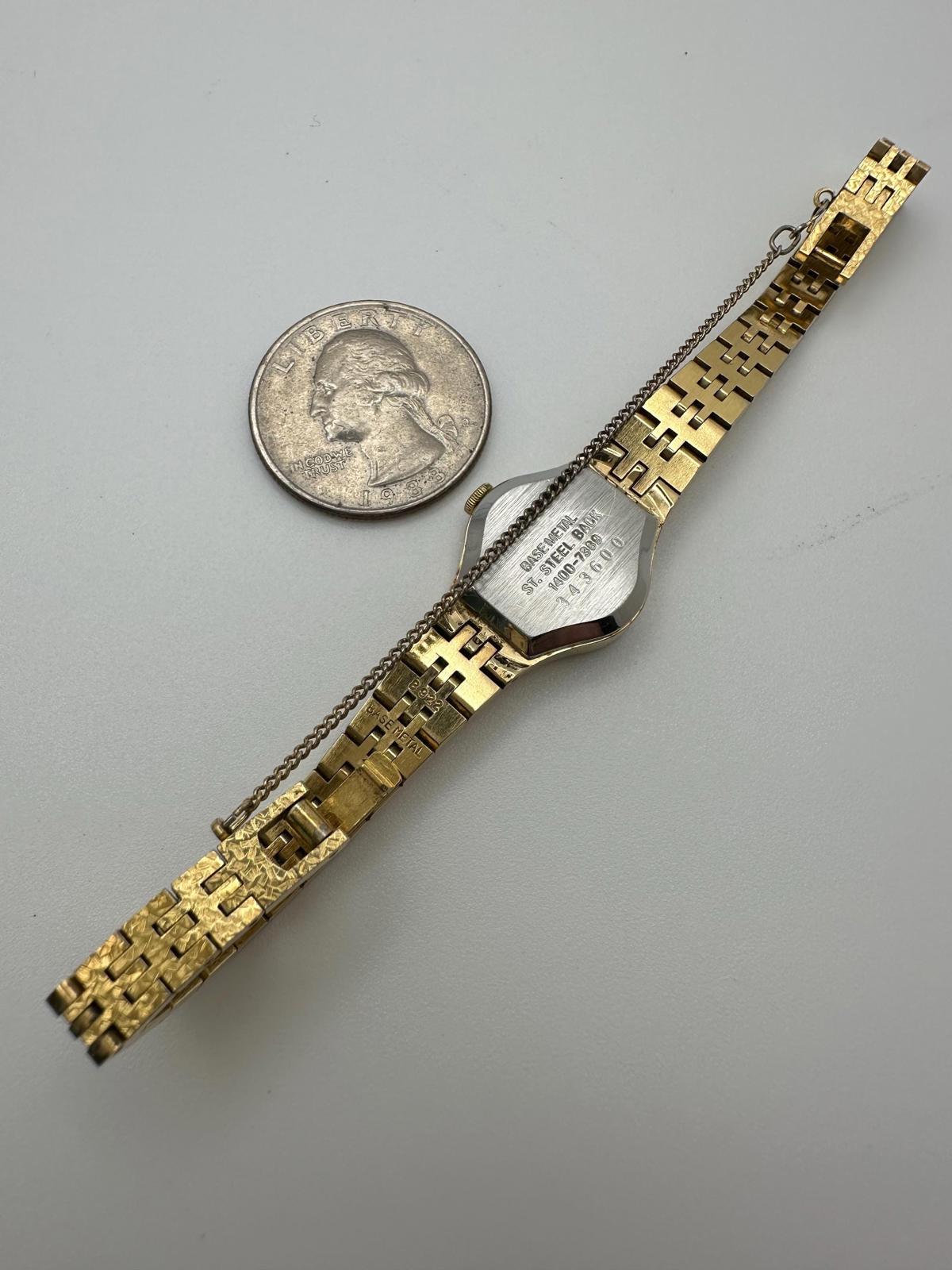 Vintage Seiko Quartz 1400-7389 Gold-Tone Textured Bracelet Watch – 1980s