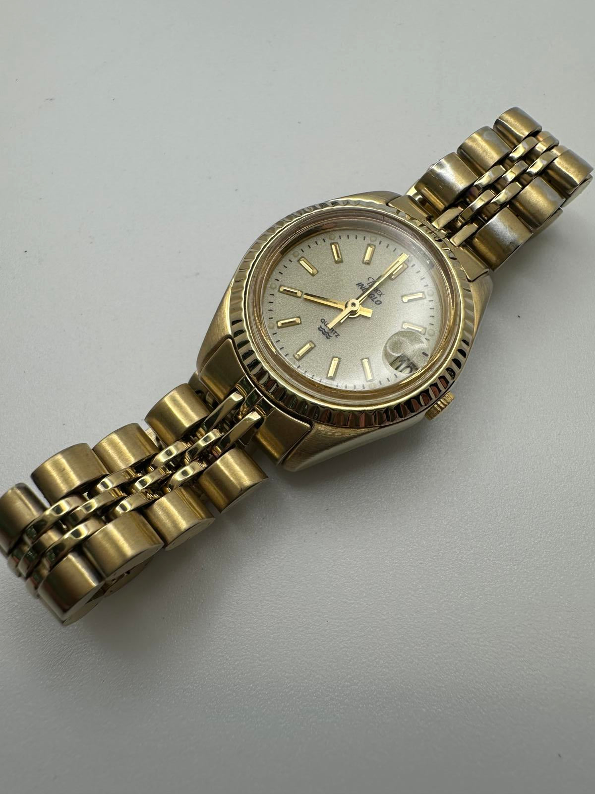 Vintage Timex Indiglo Quartz Watch – Gold Tone, Date Magnifier, Luminous Dial