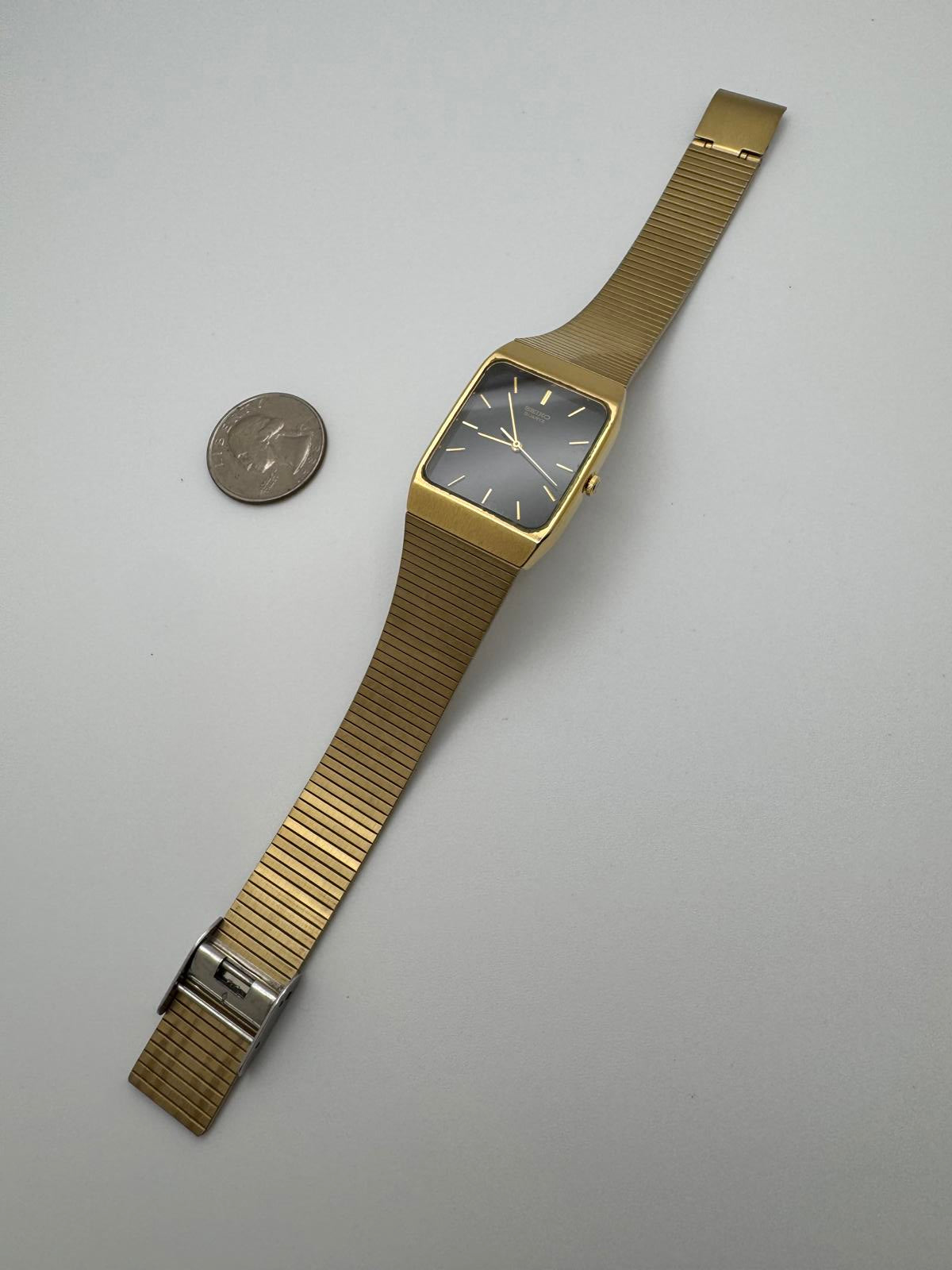 Vintage Seiko Quartz Men’s Watch – 26mm Gold Rectangular Case, Black Dial