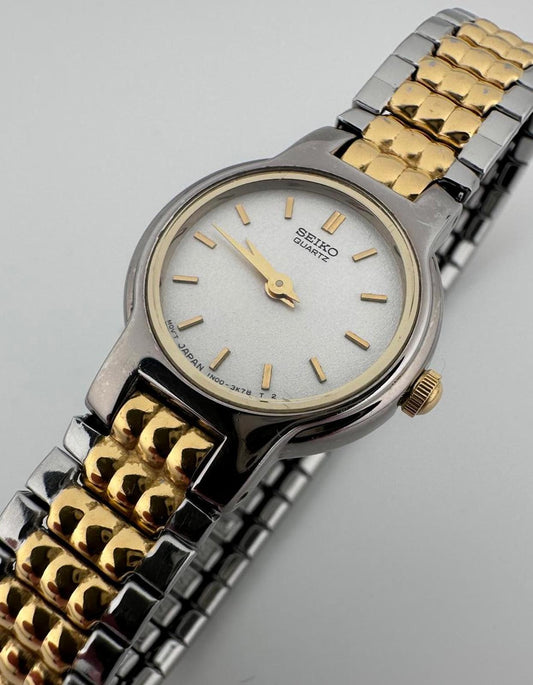 Seiko Womens Two Tone Silver Dial Quartz Stretch Bracelet Watch 1N00 3K78