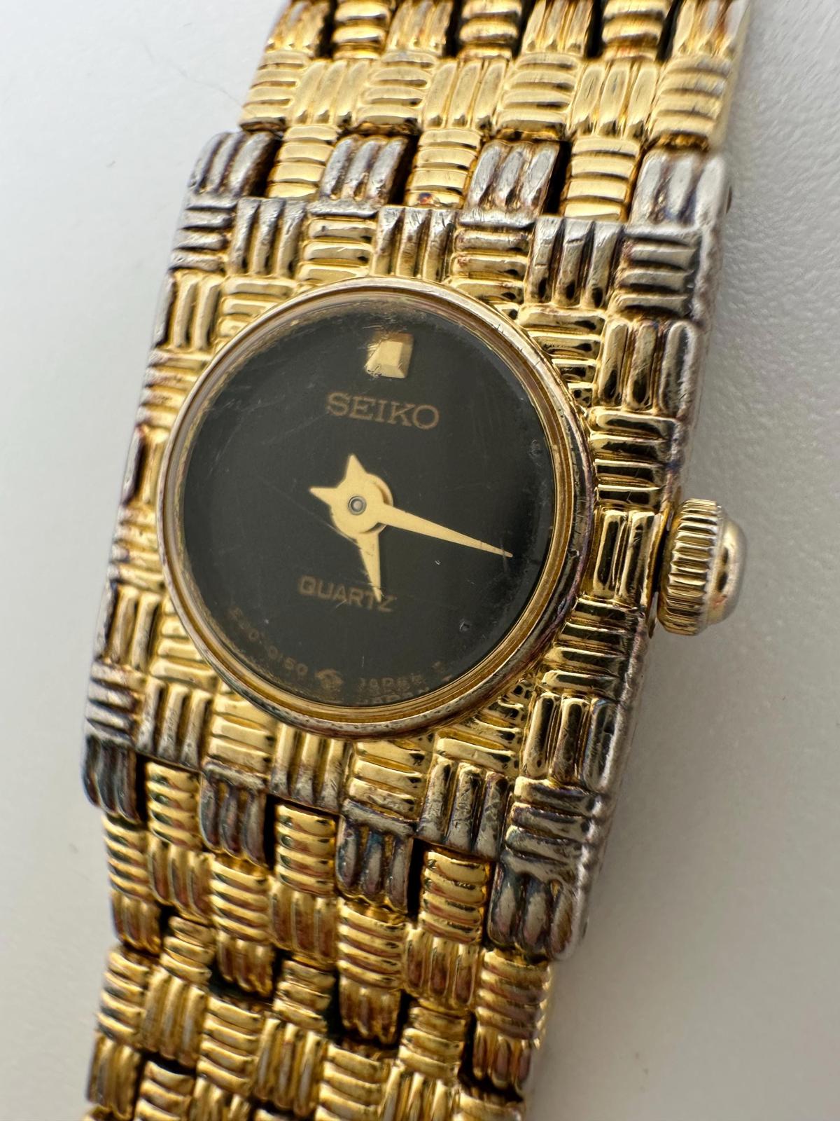 80s-90s Seiko Quartz 1E20 Women’s Gold Bracelet Watch Black Dial New Battery