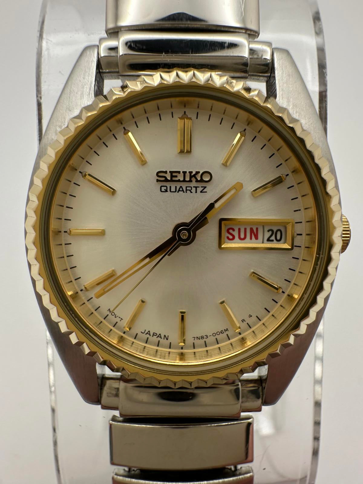Vintage Seiko Quartz Women’s Watch 24mm Gold Bezel Silver Dial Stretch Band