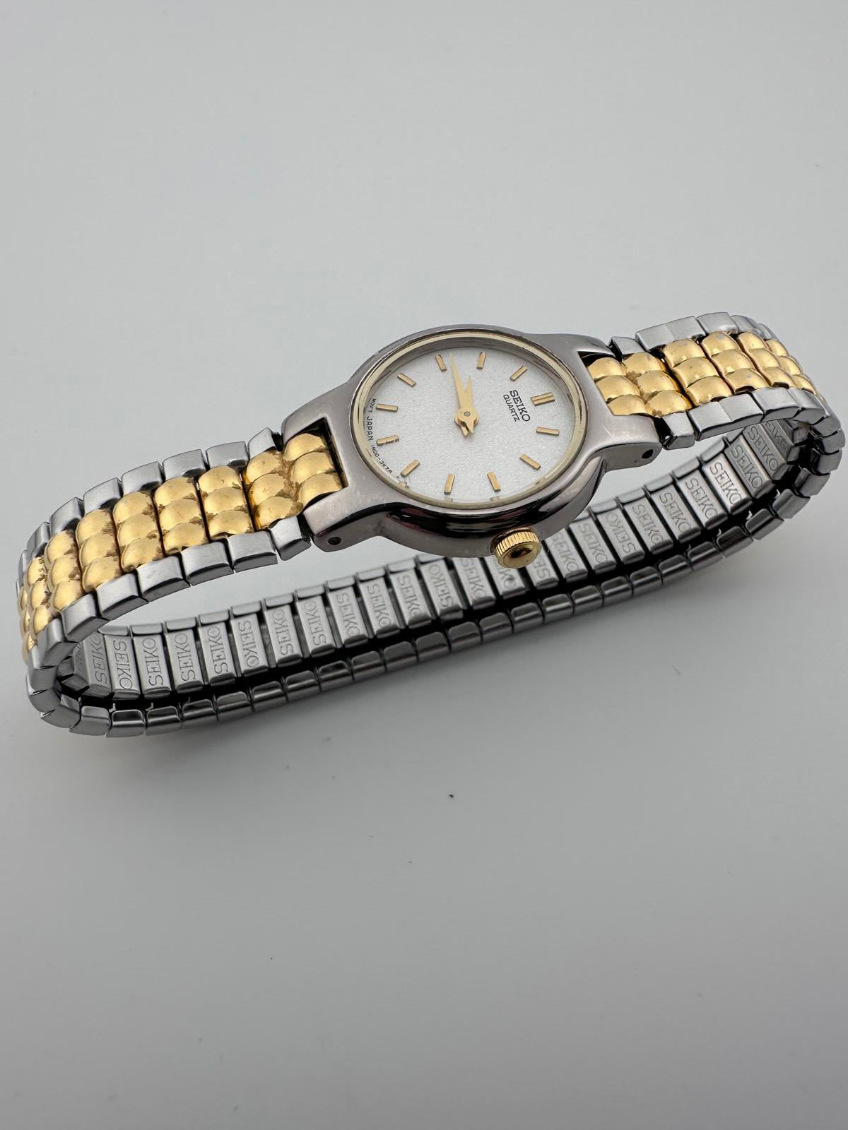 Seiko Womens Two Tone Silver Dial Quartz Stretch Bracelet Watch 1N00 3K78