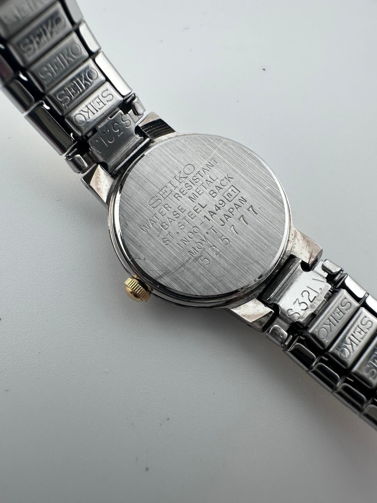 Seiko Womens Two Tone Silver Dial Quartz Stretch Bracelet Watch 1N00 3K78