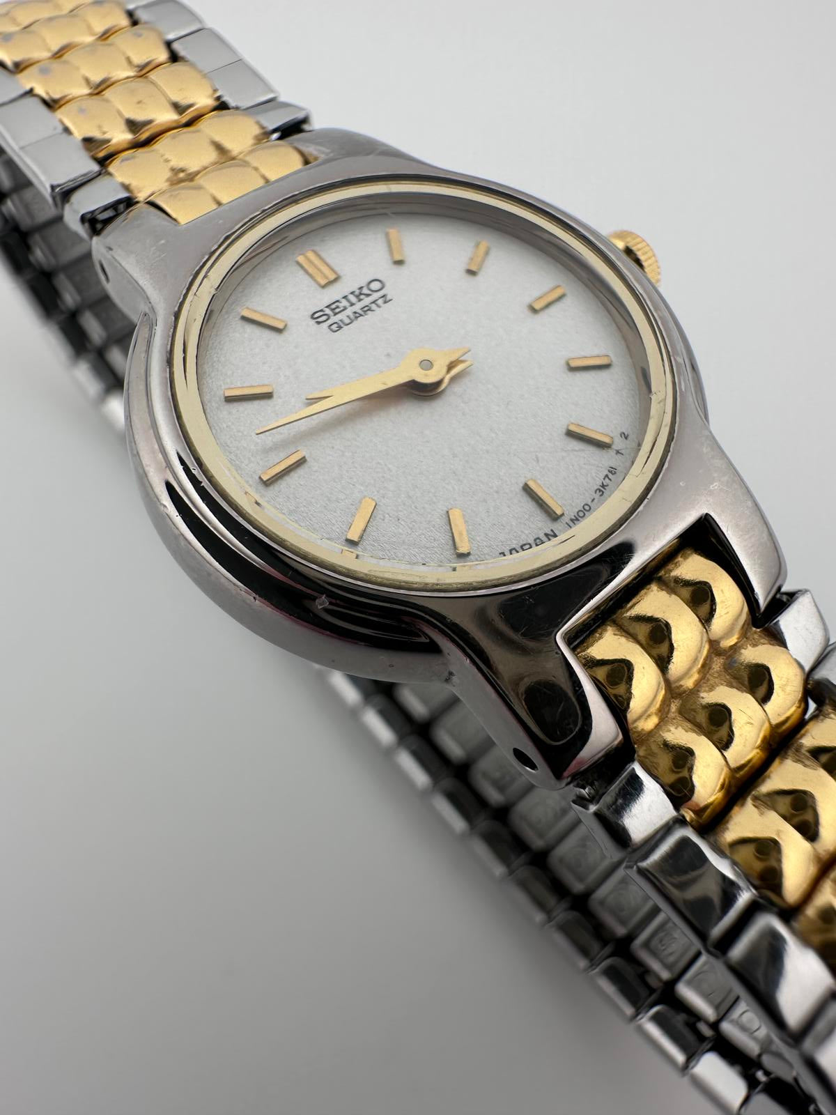 Seiko Womens Two Tone Silver Dial Quartz Stretch Bracelet Watch 1N00 3K78