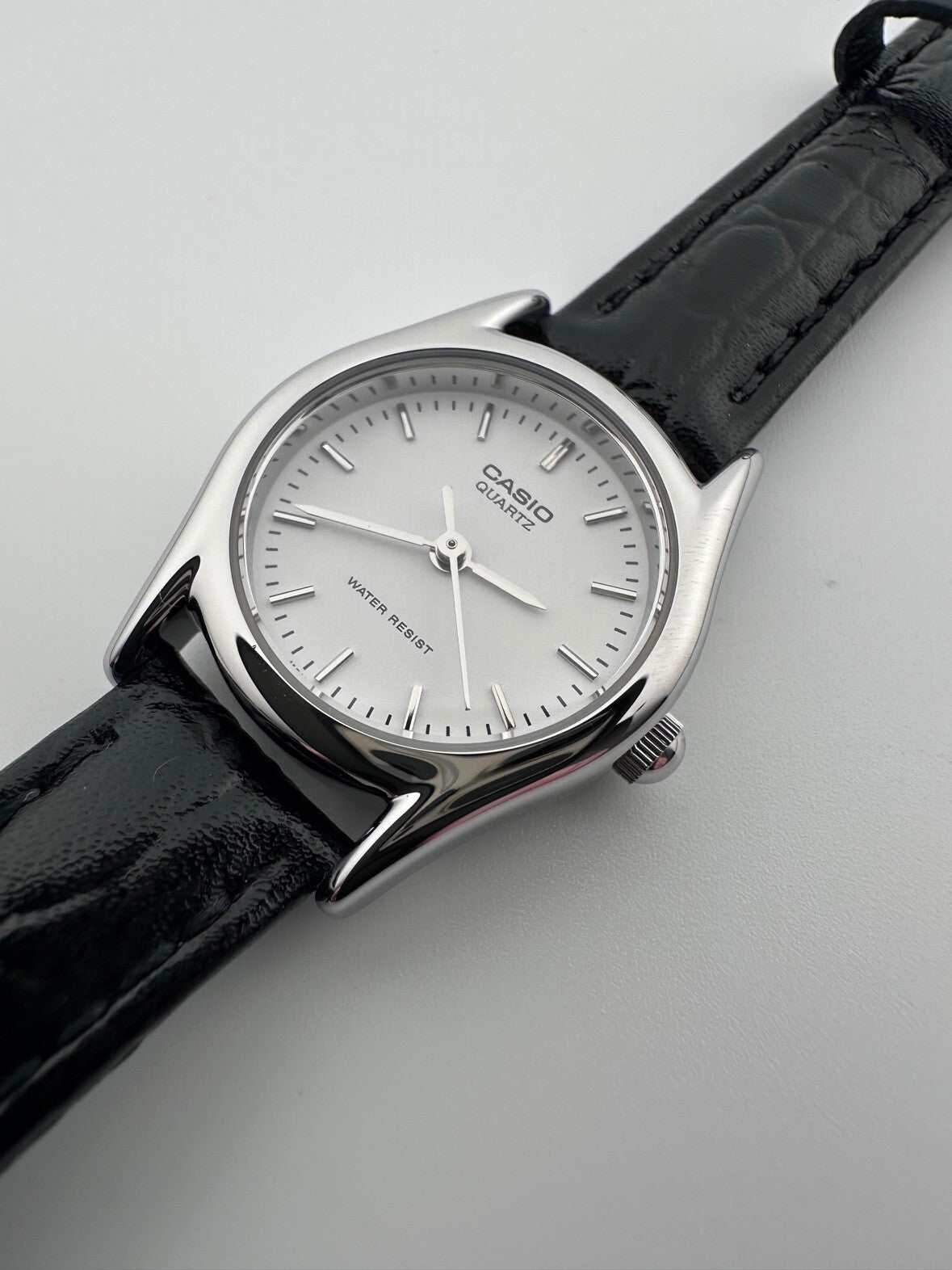 Casio Womens Quartz Watch 22mm Silver White Dial Black Leather LTP-1094E-7A