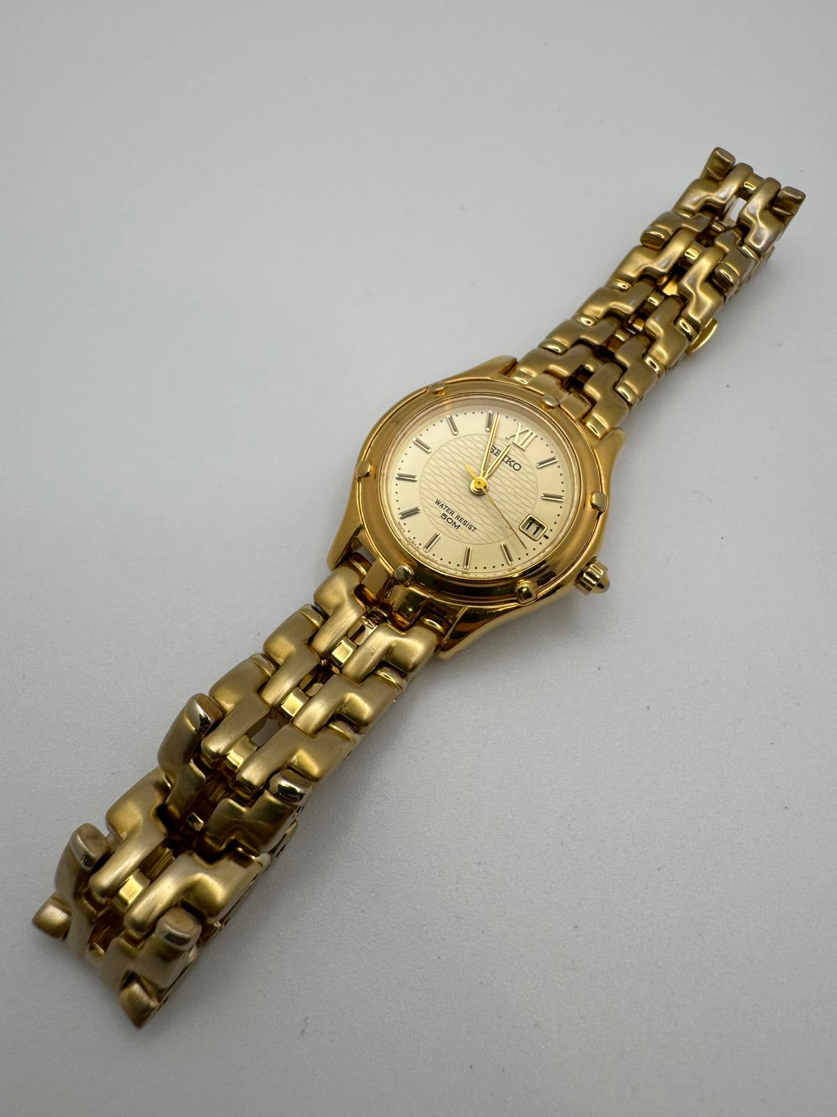 Seiko Women’s Gold Tone Quartz Watch – 24mm Date, Champagne Dial, Fresh Battery