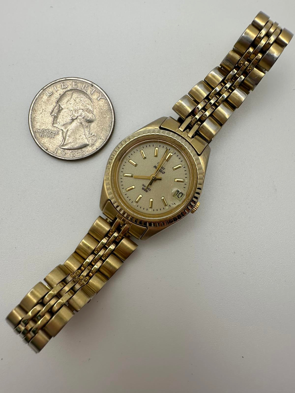 Vintage Timex Indiglo Quartz Watch – Gold Tone, Date Magnifier, Luminous Dial