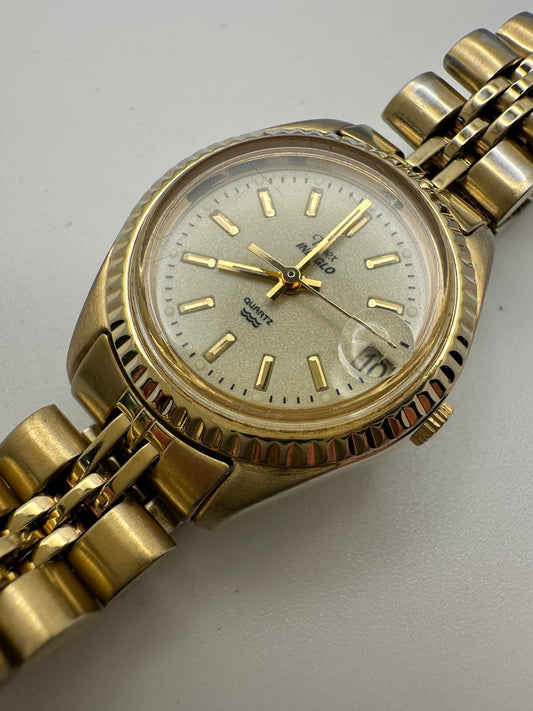 Vintage Timex Indiglo Quartz Watch – Gold Tone, Date Magnifier, Luminous Dial