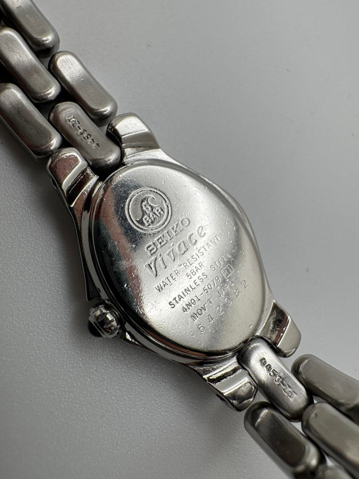 Seiko Vivace SQ50 Women’s Watch, 21mm Stainless Steel, Glow Dial, Vintage Quartz